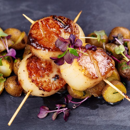 Seared scallops with a soy, honey & orange sauce