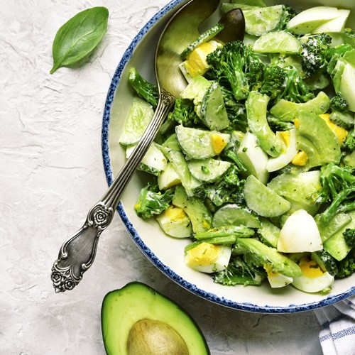 Green salad with steamed broccoli, avocado and boiled egg