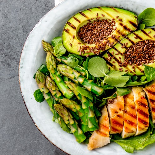 Salad with grilled chicken, avocado and asparagus